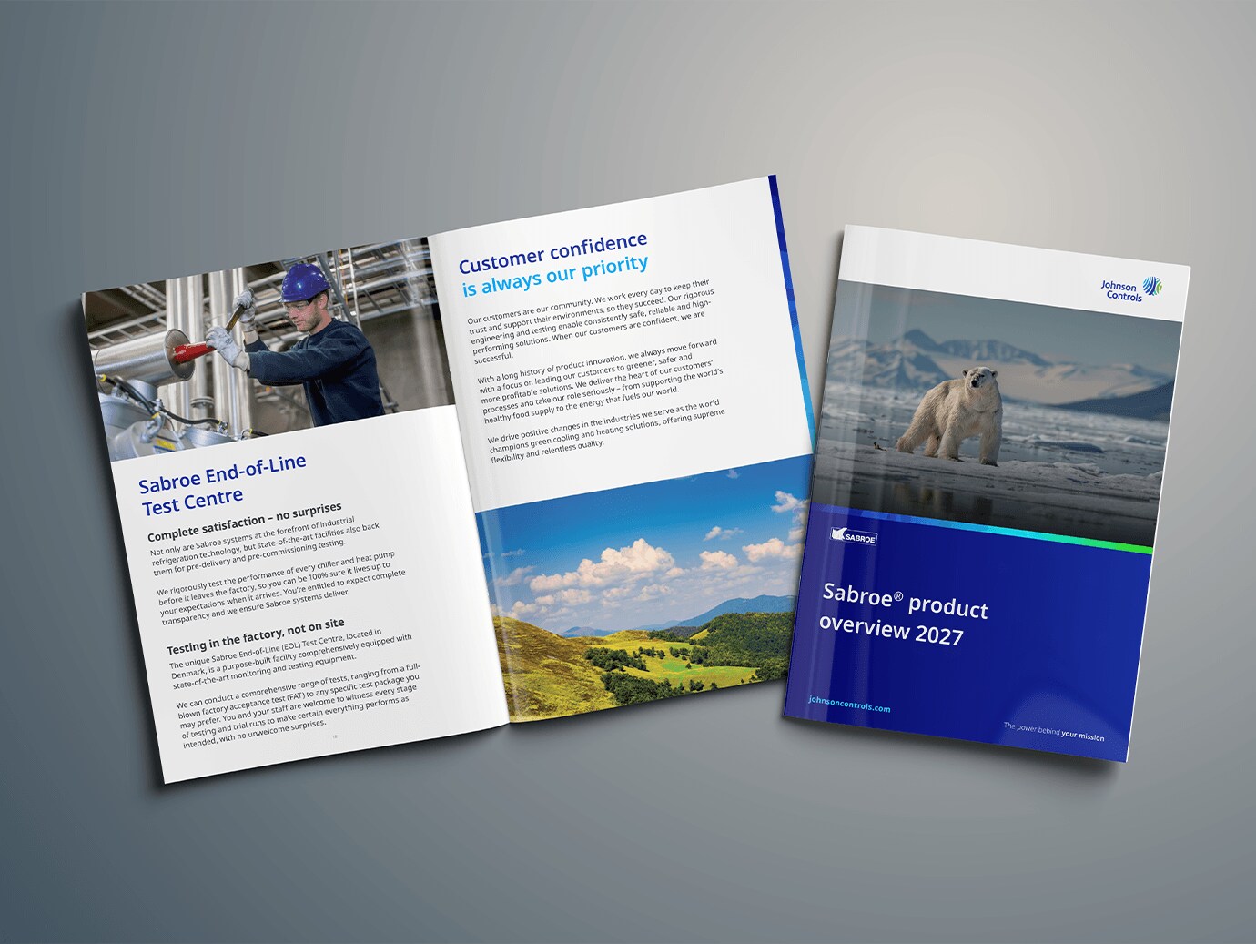 An open corporate brochure and a matching cover booklet laid out on a flat surface